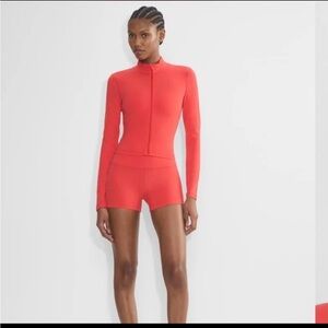 NWOT aritzia limit zip long sleeve cherry red 
Extra small